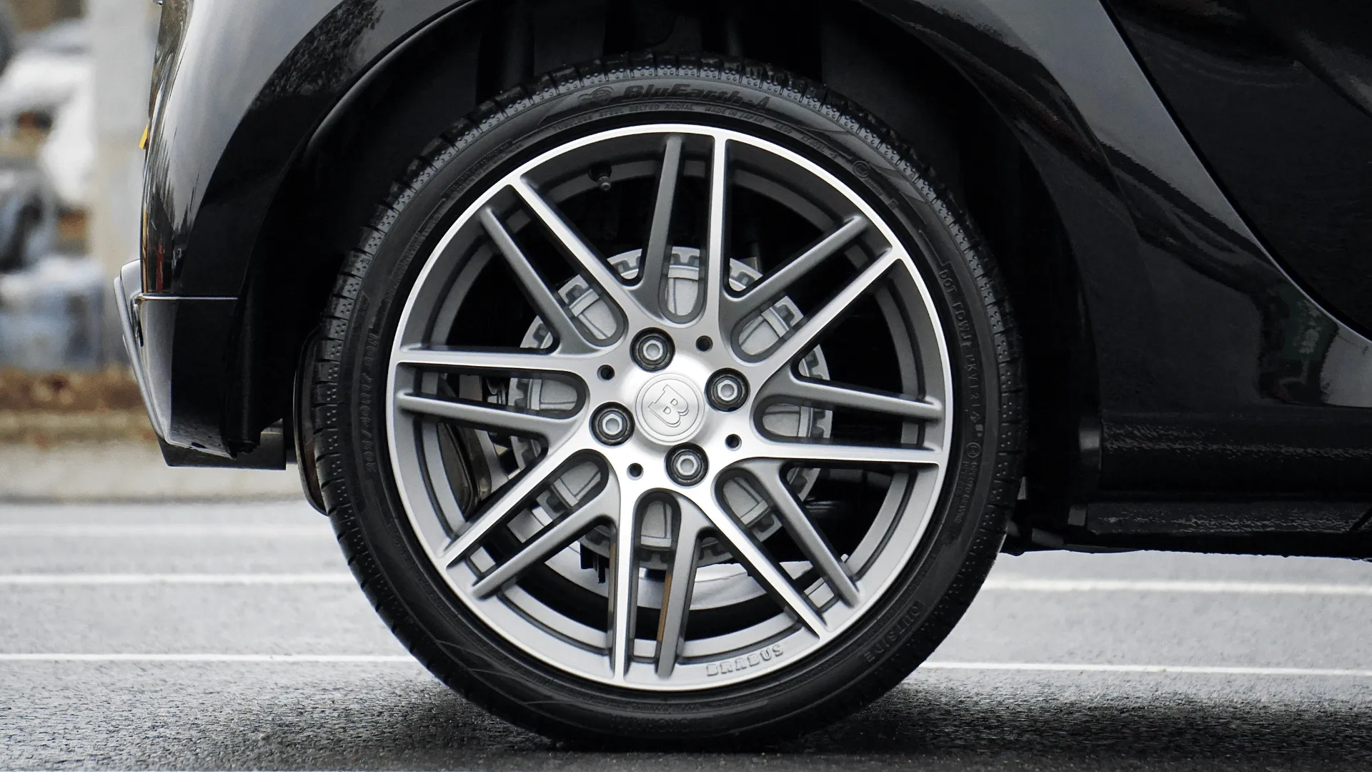 Close-up of wheel with brake dust removed after professional detailing in Tooele County